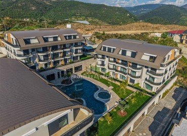 Элитные двухуровневые апартаменты 4+1, 206м² в фешенебельной резиденции в Каргыджаке, Алания под гражданство ID-19238 фото-1