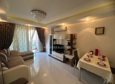 Уютная двухкомнатная квартира, 55м², с видом на горы в комфортабельном комплексе в 200м от моря в Махмутларе, Алания ID-19242 фото-6