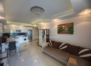 Уютная двухкомнатная квартира, 55м², с видом на горы в комфортабельном комплексе в 200м от моря в Махмутларе, Алания ID-19242 фото-7