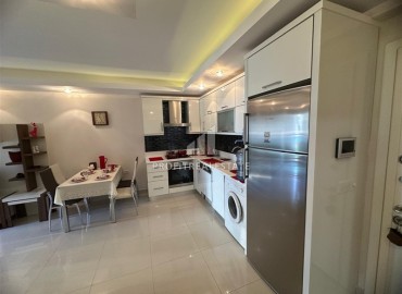 Уютная двухкомнатная квартира, 55м², с видом на горы в комфортабельном комплексе в 200м от моря в Махмутларе, Алания ID-19242 фото-9