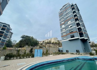 Двухкомнатные апартаменты, 70м² в новом элитном комплексе, в Авсалларе, Алания, в 900м от пляжа Инджекум ID-19244 фото-1