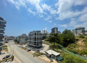 Двухкомнатные апартаменты, 70м² в новом элитном комплексе, в Авсалларе, Алания, в 900м от пляжа Инджекум ID-19244 фото-11