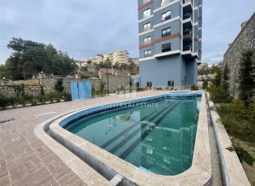 Двухкомнатные апартаменты, 70м² в новом элитном комплексе, в Авсалларе, Алания, в 900м от пляжа Инджекум ID-19244 фото-16