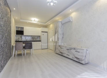 Видовые двухкомнатные апартаменты, 51м², с оригинальным интерьером, в 150м от моря в районе Каргыджак, Алания ID-19248 фото-2