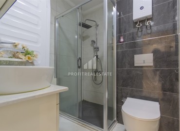 Видовые двухкомнатные апартаменты, 51м², с оригинальным интерьером, в 150м от моря в районе Каргыджак, Алания ID-19248 фото-10