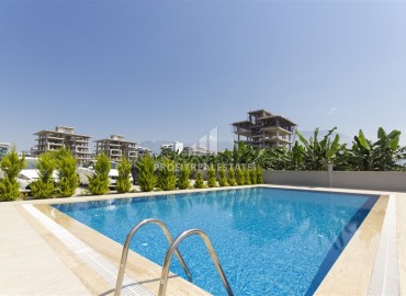 Видовые двухкомнатные апартаменты, 51м², с оригинальным интерьером, в 150м от моря в районе Каргыджак, Алания ID-19248 фото-21