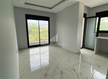 Квартира с одной спальней, 60м², с чистовой отделкой в комфортабельной новостройке в районе Тосмур, Алания ID-19249 фото-3