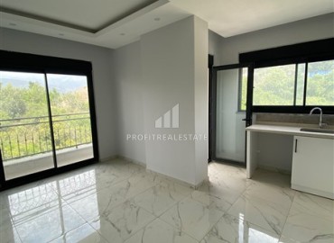 Квартира с одной спальней, 60м², с чистовой отделкой в комфортабельной новостройке в районе Тосмур, Алания ID-19249 фото-4