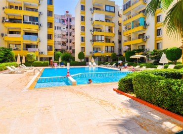 Меблированная квартира с одной спальней, 50м², в уютном комплексе с бассейном в Махмутларе, Алания ID-19250 фото-1