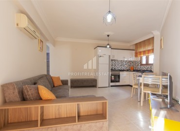 Меблированная квартира с одной спальней, 50м², в уютном комплексе с бассейном в Махмутларе, Алания ID-19250 фото-2