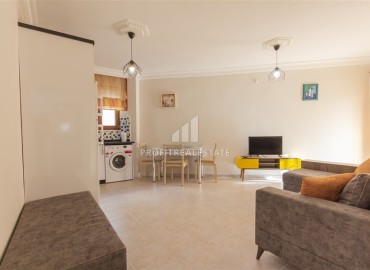 Меблированная квартира с одной спальней, 50м², в уютном комплексе с бассейном в Махмутларе, Алания ID-19250 фото-5