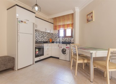 Меблированная квартира с одной спальней, 50м², в уютном комплексе с бассейном в Махмутларе, Алания ID-19250 фото-6