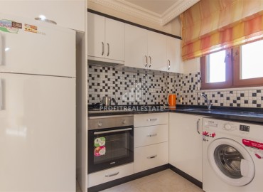 Меблированная квартира с одной спальней, 50м², в уютном комплексе с бассейном в Махмутларе, Алания ID-19250 фото-7