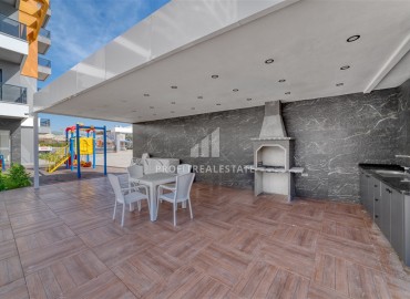Комфортабельная двухкомнатная квартира, 65м², с мебелью в комплексе премиум класса в Авсалларе, Алания ID-19251 фото-8