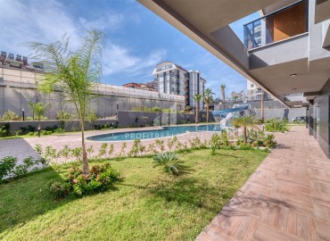 Комфортабельная двухкомнатная квартира, 65м², с мебелью в комплексе премиум класса в Авсалларе, Алания ID-19251 фото-9