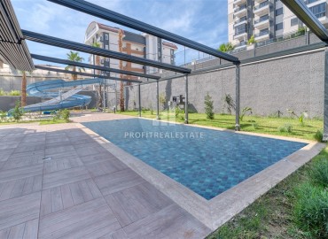 Комфортабельная двухкомнатная квартира, 65м², с мебелью в комплексе премиум класса в Авсалларе, Алания ID-19251 фото-16