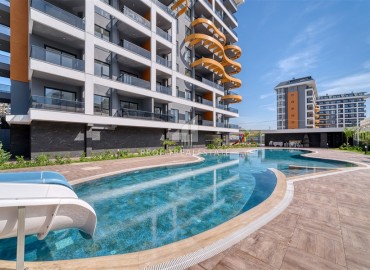 Комфортабельная двухкомнатная квартира, 65м², с мебелью в комплексе премиум класса в Авсалларе, Алания ID-19251 фото-17