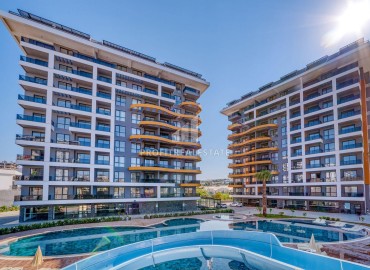 Трехкомнатная квартира, 101м² с чистовой отделкой в новостройке премиум класса в Авсалларе, Алания ID-19257 фото-12