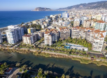 Видовые апартаменты 2+1, 115м², с дизайнерским интерьером в уютном комплексе у реки Дим Чай в районе Тосмур, Алания ID-19258 фото-1