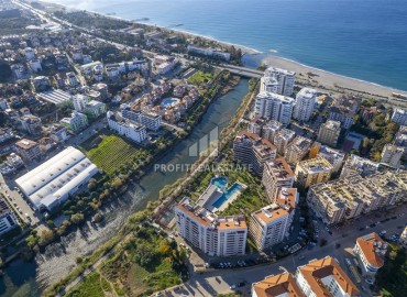 Видовые апартаменты 2+1, 115м², с дизайнерским интерьером в уютном комплексе у реки Дим Чай в районе Тосмур, Алания ID-19258 фото-34