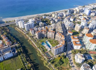 Видовые апартаменты 2+1, 115м², с дизайнерским интерьером в уютном комплексе у реки Дим Чай в районе Тосмур, Алания ID-19258 фото-35
