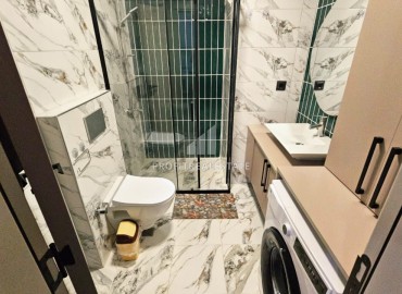 Меблированная двухкомнатная квартира, 60м² в комплексе премиум класса в 450м от моря в районе Мерсина - Тедже. ID-19259 фото-14