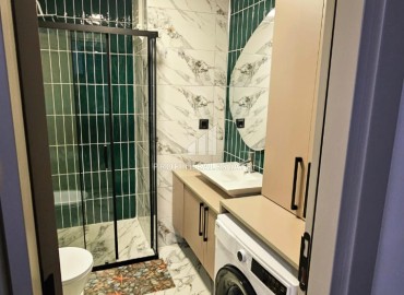 Меблированная двухкомнатная квартира, 60м² в комплексе премиум класса в 450м от моря в районе Мерсина - Тедже. ID-19259 фото-12