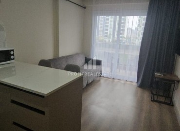 Меблированная двухкомнатная квартира, 60м² в комплексе премиум класса в 450м от моря в районе Мерсина - Тедже. ID-19259 фото-11