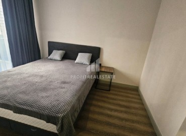 Меблированная двухкомнатная квартира, 60м² в комплексе премиум класса в 450м от моря в районе Мерсина - Тедже. ID-19259 фото-15
