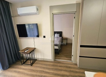 Меблированная двухкомнатная квартира, 60м² в комплексе премиум класса в 450м от моря в районе Мерсина - Тедже. ID-19259 фото-6