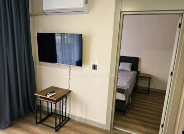 Меблированная двухкомнатная квартира, 60м² в комплексе премиум класса в 450м от моря в районе Мерсина - Тедже. ID-19259 фото-10