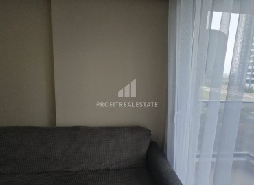 Меблированная двухкомнатная квартира, 60м² в комплексе премиум класса в 450м от моря в районе Мерсина - Тедже. ID-19259 фото-17