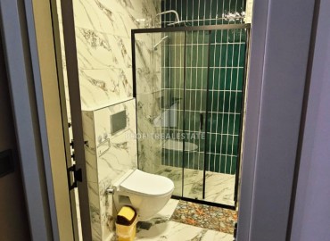 Меблированная двухкомнатная квартира, 60м² в комплексе премиум класса в 450м от моря в районе Мерсина - Тедже. ID-19259 фото-13