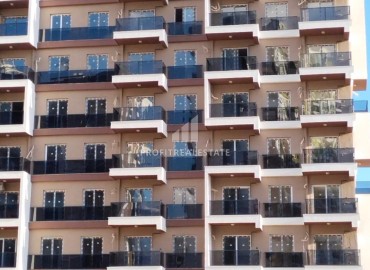 Меблированная двухкомнатная квартира, 60м² в комплексе премиум класса в 450м от моря в районе Мерсина - Тедже. ID-19259 фото-24