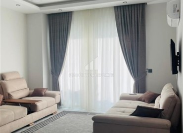 Элегантная двухкомнатная квартира, 50м², в комфортабельной резиденции не далеко от моря в Махмутларе, Алания ID-19261 фото-3