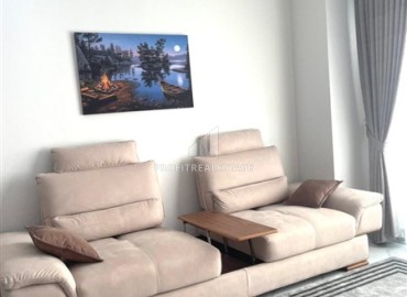 Элегантная двухкомнатная квартира, 50м², в комфортабельной резиденции не далеко от моря в Махмутларе, Алания ID-19261 фото-4