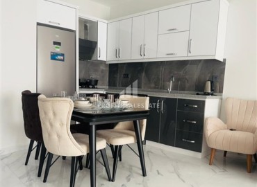 Элегантная двухкомнатная квартира, 50м², в комфортабельной резиденции не далеко от моря в Махмутларе, Алания ID-19261 фото-7