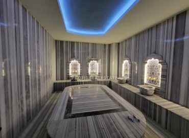 Элегантная двухкомнатная квартира, 50м², в комфортабельной резиденции не далеко от моря в Махмутларе, Алания ID-19261 фото-12
