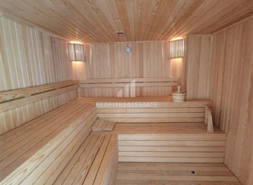 Элегантная двухкомнатная квартира, 50м², в комфортабельной резиденции не далеко от моря в Махмутларе, Алания ID-19261 фото-15