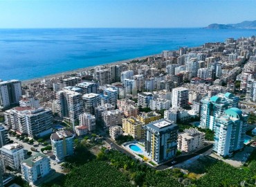 Элегантная двухкомнатная квартира, 50м², в комфортабельной резиденции не далеко от моря в Махмутларе, Алания ID-19261 фото-24