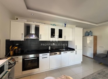 Готовая к проживанию, двухкомнатная квартира, 60м², в элитном комплексе в 200м от моря в районе Кестель, Алания ID-19262 фото-5