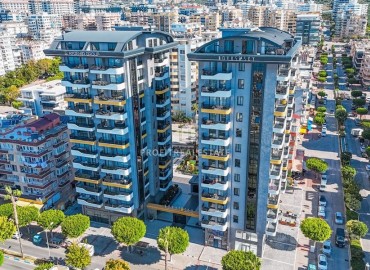 Новая квартира с двумя спальнями, 110м². в элитном комплексе на центральной улице района Махмутлар, Алания ID-19263 фото-1
