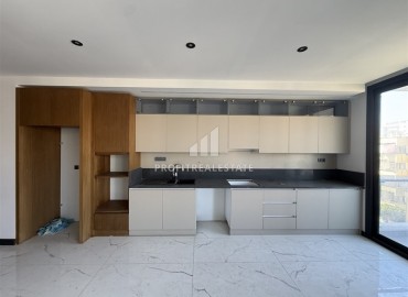 Новая квартира с двумя спальнями, 110м². в элитном комплексе на центральной улице района Махмутлар, Алания ID-19263 фото-3