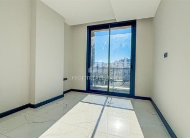 Новая квартира с двумя спальнями, 110м². в элитном комплексе на центральной улице района Махмутлар, Алания ID-19263 фото-11