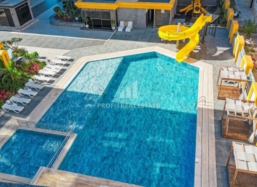 Новая квартира с двумя спальнями, 110м². в элитном комплексе на центральной улице района Махмутлар, Алания ID-19263 фото-18