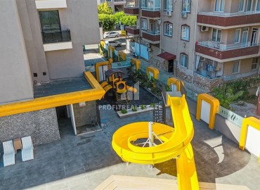 Новая квартира с двумя спальнями, 110м². в элитном комплексе на центральной улице района Махмутлар, Алания ID-19263 фото-19