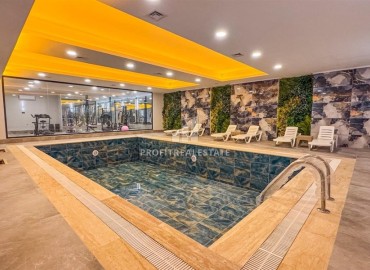 Новая квартира с двумя спальнями, 110м². в элитном комплексе на центральной улице района Махмутлар, Алания ID-19263 фото-24