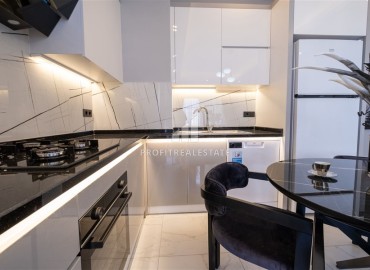 Апартаменты 1+1, 54м², с дизайнерским интерьером в премиум-комплексе в 100м от моря в районе Каргыджак, Алания ID-19266 фото-7