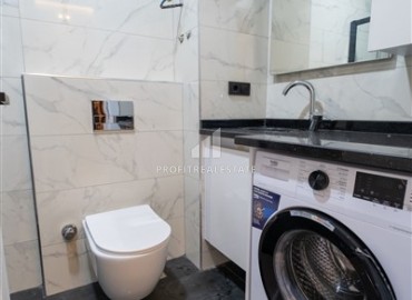 Апартаменты 1+1, 54м², с дизайнерским интерьером в премиум-комплексе в 100м от моря в районе Каргыджак, Алания ID-19266 фото-9