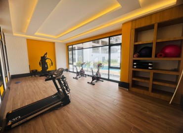 Апартаменты 1+1, 54м², с дизайнерским интерьером в премиум-комплексе в 100м от моря в районе Каргыджак, Алания ID-19266 фото-20